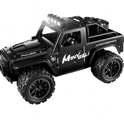 Zwarte VorteX bestuurbare offroad auto met robuuste banden en heldere ledverlichting op het dak.